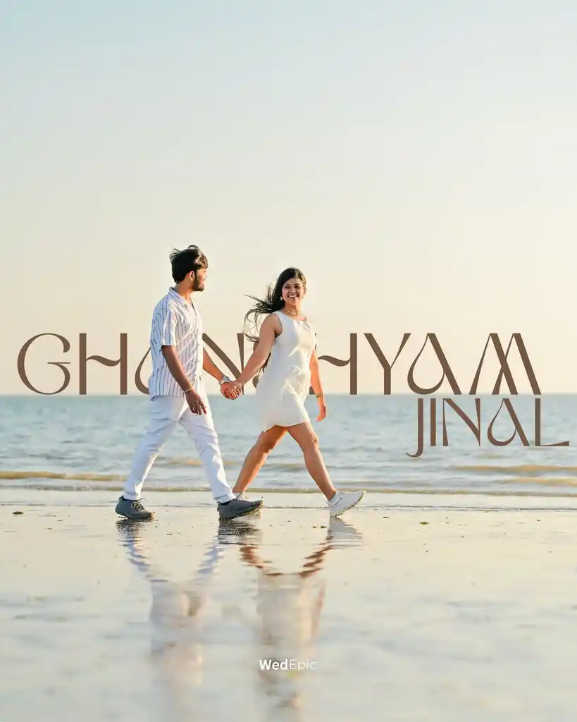 Couple walking hand in hand on the shore at Ghandhyam and Jinal's pre wedding shoot